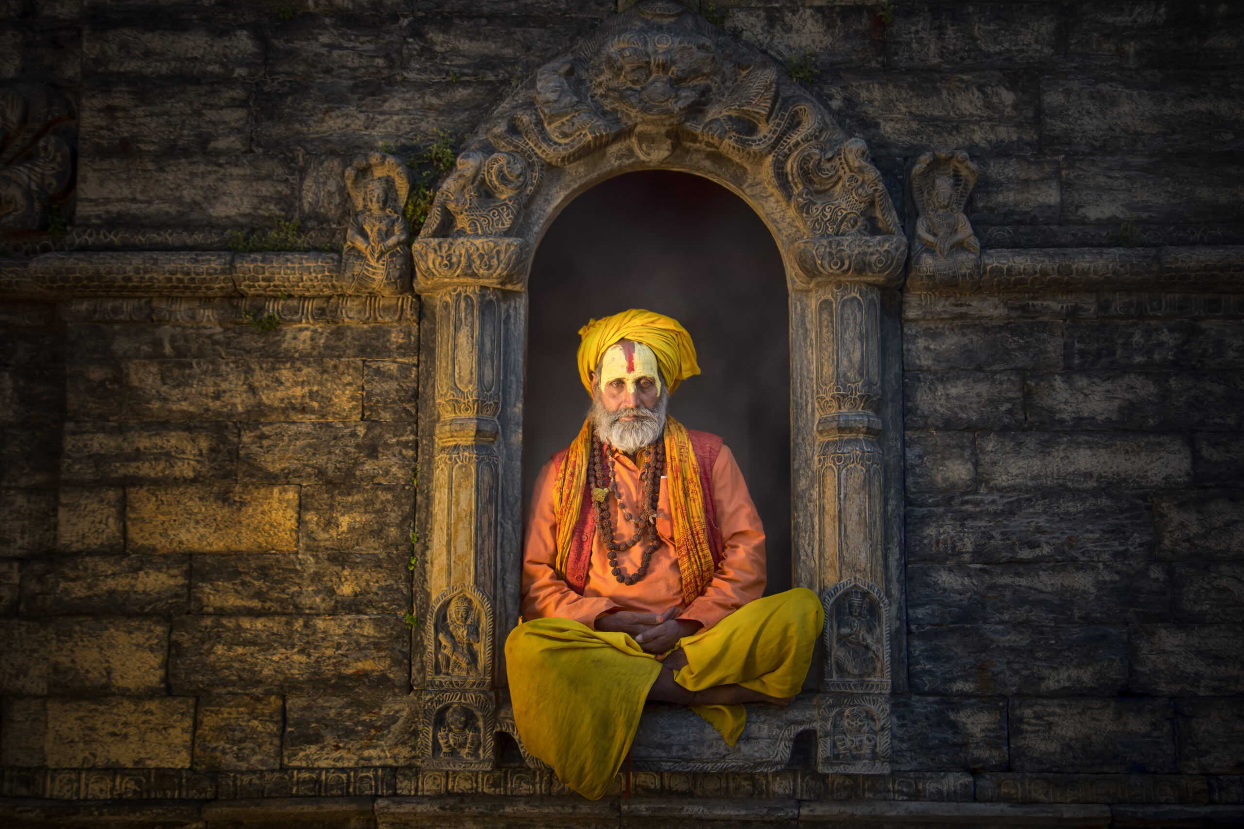 KATHMANDU, NEPAL - Mar 25: Holy Sadhu men with traditional painted face, blessing in Pashupatinath Temple. Mar 25, 2017 in Nepal, Kathmandu.